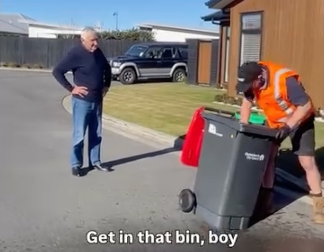 A frame from one of Blair's reels, a bin being wheeled out for a blast