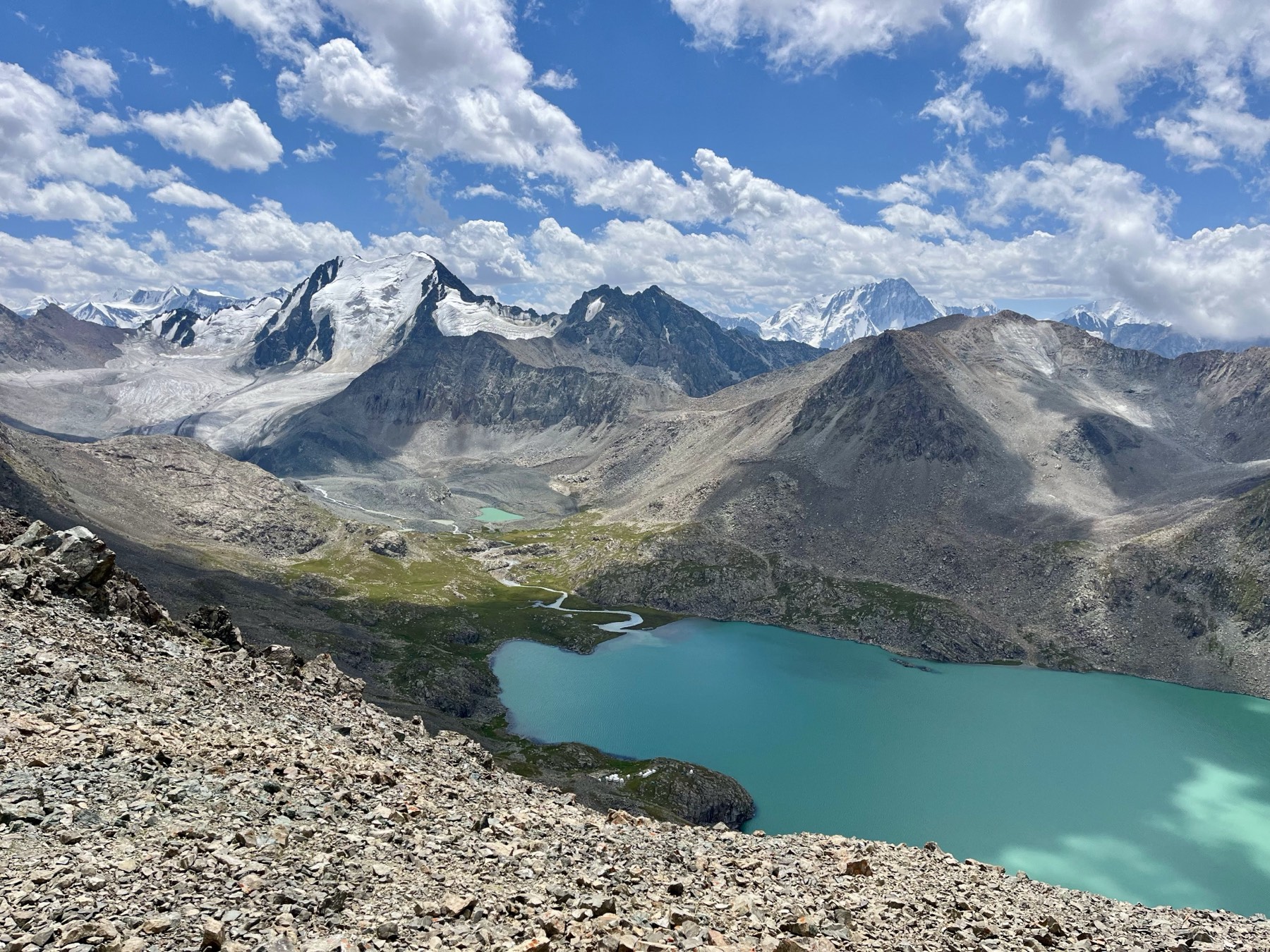 Ala-Kul alpine lake and glacier valley high in the mountains of Kyrgyzstan